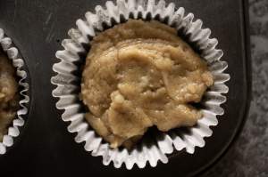 Gingerbread Muffins with the batter poured in a cupcake liner