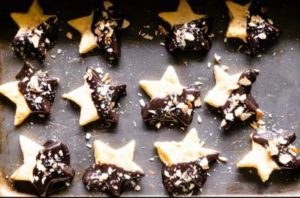 Holiday Shortbread Star Shaped Cookies topped with chocolate and almonds