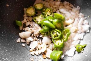 cooking onion and jalapenos